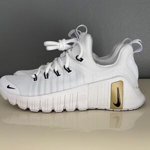 Nike White and Gold Athletic Shoes